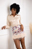 Mini high waisted skirt with pink feathers